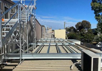 Roof plant platform installation at a food manufacturing facility.