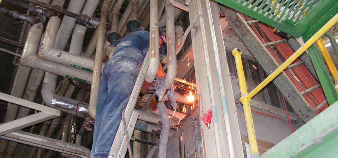 Pipe-Fabrication-Industrial-Plant-Maintenance-pipe welder, Melbourne pipe welding, industrial pipe weld, man welding pipe