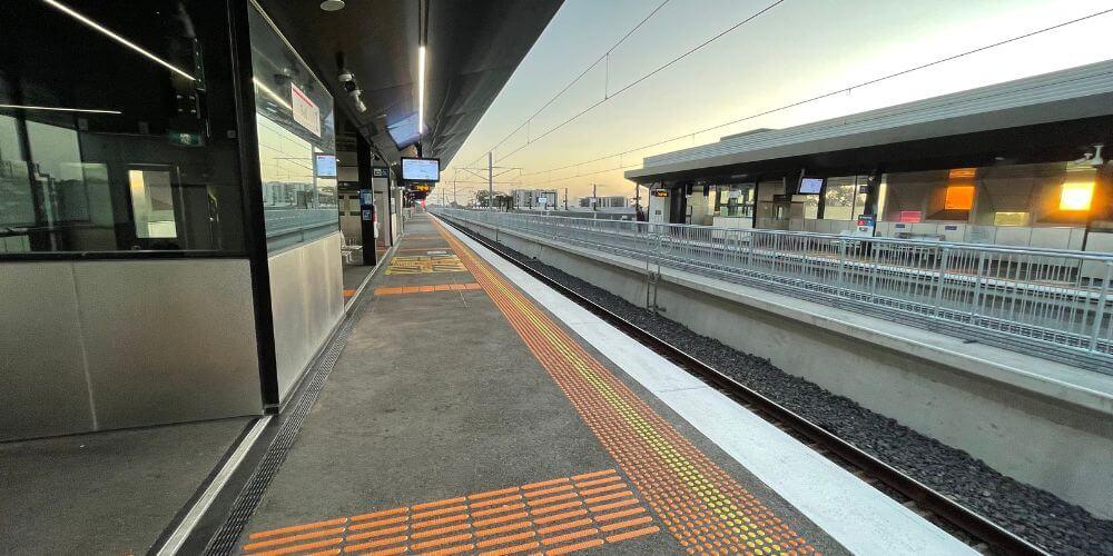 steel rails, steel handrails in Bell Station, metal handrails in train station